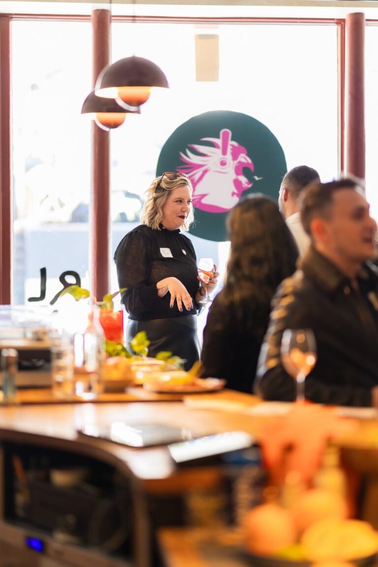 Kayla in conversation at a Good Trouble event